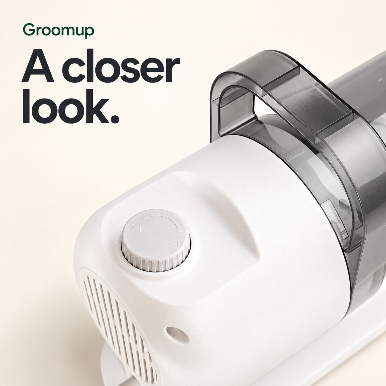 Close-up of the Groomup vacuum handle and adjustment dial